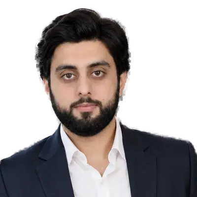 Haider Bajwa, the Launch VRO founder, in a navy blazer and white shirt.